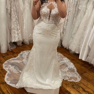 Brand new with tags Essence of Australia wedding dress size 12